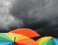 Umbrellas in a storm
