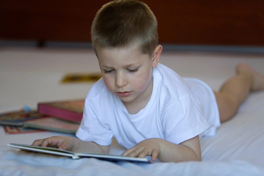 Child reading a book