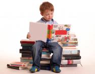 Young boy reading books Young boy reading books