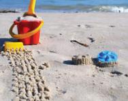 Bucket and spade on the beach Bucket and spade on the beach