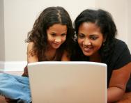 Child and parent research on the computer Child and parent research on the computer