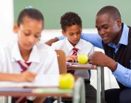 Child and teacher in the classroom Child and teacher in the classroom