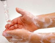 Child washing hands at sink Child washing hands at sink