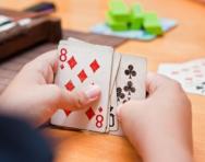 Child playing cards Child playing cards