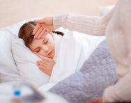 Child unwell in bed Child unwell in bed
