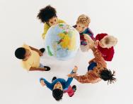 Children playing throwing globe Children playing throwing globe