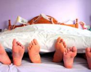 Family relaxing in bed Family relaxing in bed
