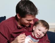 Father laughing with son Father laughing with son