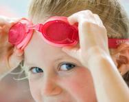Girl in primary school wearing swimming goggles Girl in primary school wearing swimming goggles