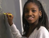 Girl writing on blackboard Girl writing on blackboard