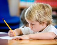 Little boy writing Little boy writing