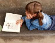Little girl reading a book Little girl reading a book