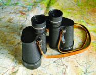 Map and binoculars Map and binoculars