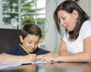 Mother and son doing homework Mother and son doing homework