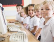 Primary-school children using computers Primary-school children using computers