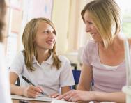Pupil and teacher in class Pupil and teacher in class