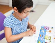 Reception child reading Reception child reading