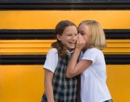 School girls sharing secrets School girls sharing secrets