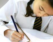 Schoolgirl writing Schoolgirl writing