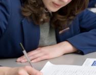 Secondary school girl writing Secondary school girl writing