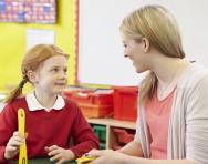 Teacher and child in the classroom Teacher and child in the classroom