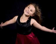 Theatrical child on stage Theatrical child on stage