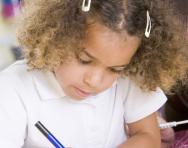 Year 1 child learning numeracy Year 1 child learning numeracy