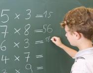 boy doing multiplication boy doing multiplication