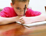 SEN child writing SEN child writing