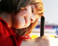 Reception child writing Reception child writing