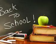 'Back to school' written on blackboard