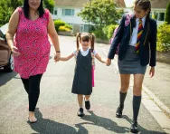 Walking on the school run with mother and sister Walking on the school run with mother and sister