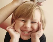 Boy being treated for headlice