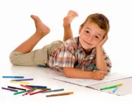 Boy doing drawings Boy doing drawings