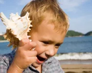 Boy relaxing at the beach