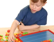 Boy learning phonics sounds