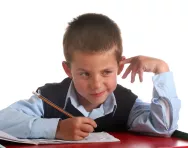 Boy thinking in class
