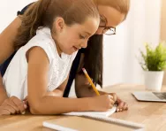 Child and parent writing Child and parent writing