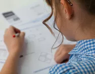 Child completing exam
