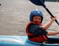 Child in canoe Child in canoe
