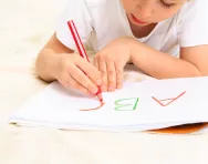Child learning to write at home Child learning to write at home