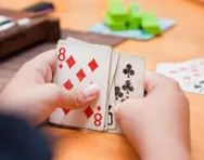 Child playing cards Child playing cards