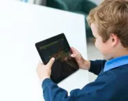 Child playing on tablet Child playing on tablet
