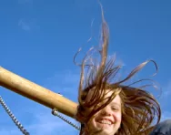 Child swinging Child swinging