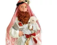Child wearing a handmade nativity costume