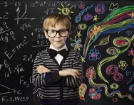 Creative child at the blackboard