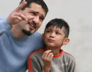 Dad talking to son