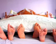 Family relaxing in bed Family relaxing in bed