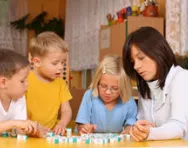 Family playing spelling game