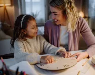 Mother and daughter with clock Mother and daughter with clock